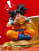 Goku Eating Burger By HS Studio